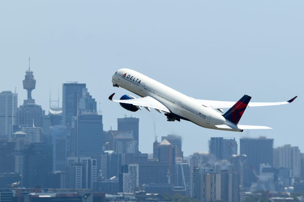 Delta profits beat expectations but company warns of slowing growth, scales back expansion plans for second half