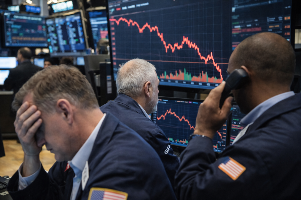 Dow Jones falls 253 points as Iran tensions, earnings weigh mood